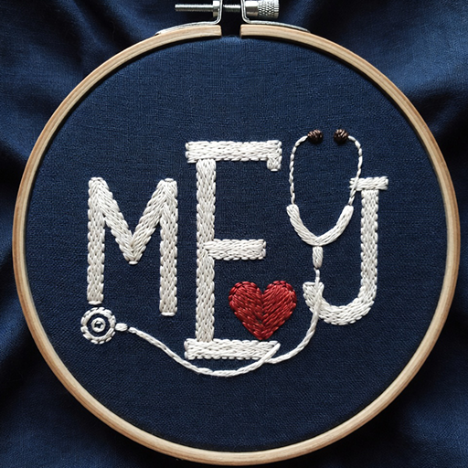 Embroidered hoop with the letters M and E, a red heart, and a white stethoscope on navy fabric